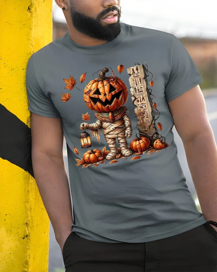 Pumpkin Mummy Halloween Lantern Graphic T-Shirt - model in grey shirt leaning against column