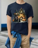 Halloween Witch Pumpkin House Black Cat Graphic T-Shirt - model wearing navy shirt, hands in pockets