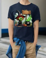 Halloween Green Witch Cauldron Potion Graphic T-Shirt - model wearing navy shirt, hands in pockets