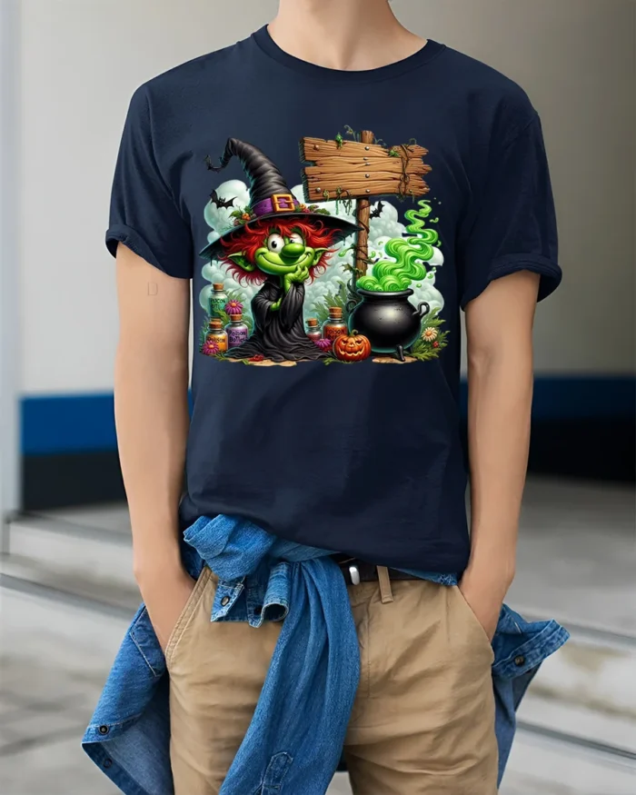 Halloween Green Witch Cauldron Potion Graphic T-Shirt - model wearing navy shirt, hands in pockets