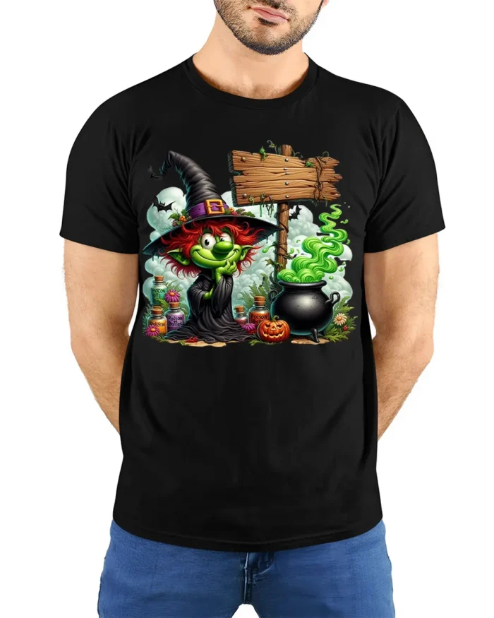 Halloween Green Witch Cauldron Potion Graphic T-Shirt - model wearing black shirt, hands behind back