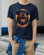 Fierce Rottweiler Graphic T Shirt Bold Dog Lover Tee - model wearing navy tee with hands in pockets