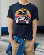 Retro Start Button Gamer Controller T Shirt - model wearing navy tee with hands in pockets