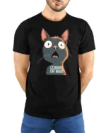 Funny Shocked Cat Graphic T Shirt Viral Meme Tee - model wearing black tee with hands behind back