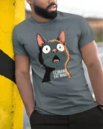 Funny Shocked Cat Graphic T Shirt Viral Meme Tee - model wearing grey tee, leaning on column