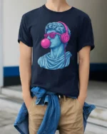 Cool David Statue With Headphones Bubblegum Pop Art T Shirt - model wearing navy tee with hands in pockets