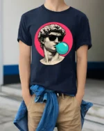 Cool David Statue Bubblegum Pop Art Graphic T Shirt Retro Aesthetic - model wearing navy tee with hands in pockets