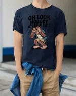 Oh Look Nobody Gives A Shit Funny Bigfoot Sarcastic Humor T Shirt - model wearing navy tee with hands in pockets