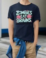 Zombies Eat Brains Funny Zombie Humor Graphic T Shirt - model wearing navy tee with hands in pockets