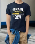 Brain Loading Please Wait Funny Sarcastic Humor Graphic T Shirt - model wearing navy tee with hands in pockets