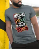 Mistakes Are Proof That You Are Trying Inspirational Quote T Shirt - model wearing grey tee, leaning on column