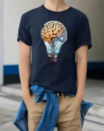 Creative Brain Lightbulb Idea Graphic T Shirt Science Nerd Tee - model wearing navy tee with hands in pockets