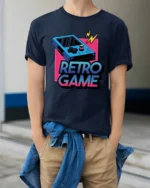 Retro Game Console Graphic T Shirt Vintage Gamer Arcade Style Tee - model wearing navy tee with hands in pockets