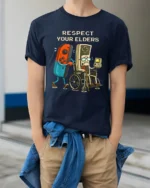 Respect Your Elders Retro Gaming Humor Graphic T Shirt Gamer Tee - model wearing navy tee with hands in pockets