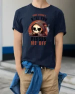 Funny Grim Reaper What Doesnt Kill You Pisses Me Off Graphic T Shirt - model wearing navy tee with hands in pockets
