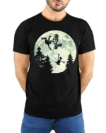 Funny Moonlight BMX Alien Parody Graphic T Shirt Retro Bike Tee - model wearing black tee with hands behind back