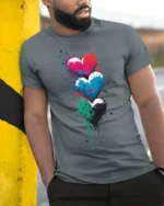 Colorful Graffiti Hearts Love Graphic T Shirt Artistic Street Style Tee - model wearing grey tee, leaning on column