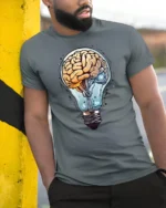 Creative Brain Lightbulb Idea Graphic T Shirt Science Nerd Tee - model wearing grey tee, leaning on column