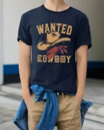 Wanted Cowboy Hat Vintage Western Graphic T Shirt Country Style - model wearing navy tee with hands in pockets