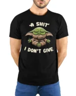 A Shit I Dont Give Funny Meditating Baby Alien Meme T Shirt - model wearing black tee with hands behind back