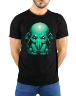 Cute Cthulhu Monster T Shirt Adorable Lovecraft Inspired Cartoon Graphic - model wearing black tee with hands behind back