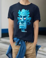 Blue Tribal Tiki Mask Graphic T Shirt Retro Island Art - model wearing navy tee with hands in pockets