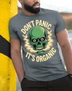 Funny Dont Panic Its Organic Skull Humor Graphic T Shirt - model wearing grey tee, leaning on column