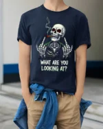 Funny Skeleton Smoking Cigar What Are You Looking At T Shirt - model wearing navy tee with hands in pockets