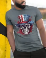 Patriotic Skull Uncle Sam Hat American Flag Graphic T Shirt - model wearing grey tee, leaning on column