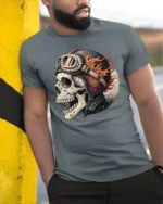 Flaming Biker Skull With Vintage Helmet Graphic T Shirt - model wearing grey tee, leaning on column