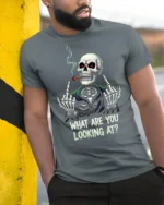 Funny Skeleton Smoking Cigar What Are You Looking At T Shirt - model wearing grey tee, leaning on column