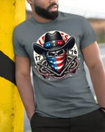 Patriotic Cowboy Skull 1776 Western American Graphic T Shirt - model wearing grey tee, leaning on column