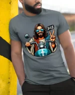 Funny Biker Jesus BRB Peace Sign Motorcycle Graphic T Shirt - model wearing grey tee, leaning on column