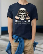 Who Cares Skull Rebel Attitude Graphic Biker Style T Shirt - model wearing navy tee with hands in pockets