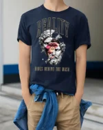 Reality Hides Behind The Mask Surreal Statue Graphic T Shirt - model wearing navy tee with hands in pockets