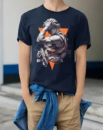 Modern Renaissance Warrior Statue Graphic T Shirt Bold Art Tee - model wearing navy tee with hands in pockets