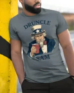 Funny Druncle Sam Patriotic Party Humor Graphic T Shirt - model wearing grey tee, leaning on column