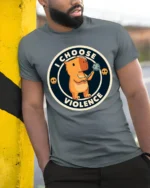 Funny I Choose Violence Cute Angry Capybara Graphic T Shirt - model wearing grey tee, leaning on column