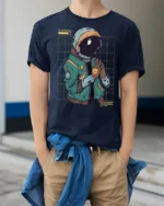 Charging Astronaut Graphic T Shirt Futuristic Space Humor Tee - model wearing navy tee with hands in pockets