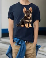 Cute German Shepherd Puppy Graphic T Shirt Dog Lover Tee - model wearing navy tee with hands in pockets