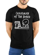 Funny Chairman Of The Bored Office Humor Graphic T Shirt - model wearing black tee with hands behind back