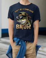 Dont Be A Dumb Bass Bruh Funny Fishing Humor Graphic T Shirt - model wearing navy tee with hands in pockets