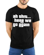 Ah Shit Here We Go Again Funny Meme Quote Graphic T Shirt - model wearing black tee with hands behind back