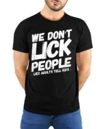 We Dont Lick People Funny Sarcastic Humor Quote T Shirt - model wearing black tee with hands behind back
