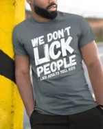 We Dont Lick People Funny Sarcastic Humor Quote T Shirt - model wearing grey tee, leaning on column