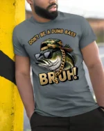 Dont Be A Dumb Bass Bruh Funny Fishing Humor Graphic T Shirt - model wearing grey tee, leaning on column