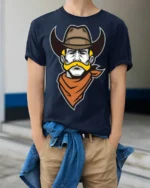 Retro Cowboy Mustache Graphic T Shirt Western Outlaw Style Tee - model wearing navy tee with hands in pockets