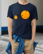 Funny Orange Juice Pee Humor Graphic T Shirt Silly Cartoon Tee - model wearing navy tee with hands in pockets