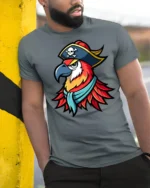 Pirate Parrot Captain Graphic T Shirt Colorful Bird Adventure Tee - model wearing grey tee, leaning on column