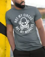 Not My Circus Not My Monkeys Funny Skull Graphic T Shirt Tee - model wearing grey tee, leaning on column